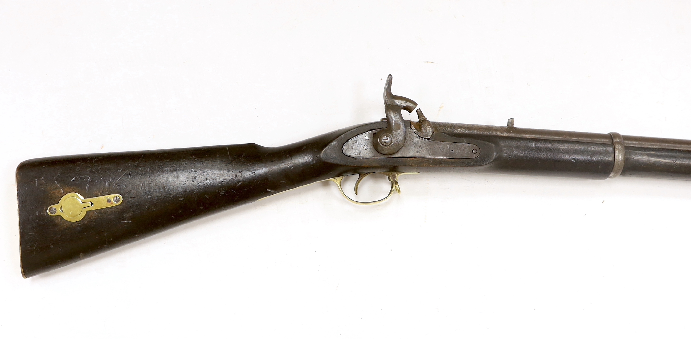 A Victorian percussion cap rifle (Tower Carbine), lock stamped 1859 TOWER and VR cypher, two barrel bands and compartment in stock, barrel 74cm